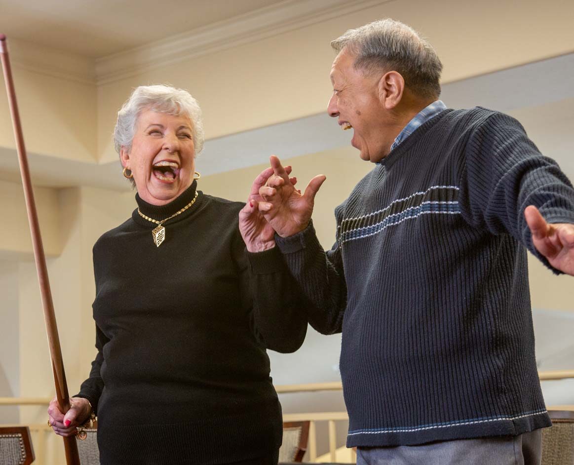 Alexis Estates seniors playing billiards