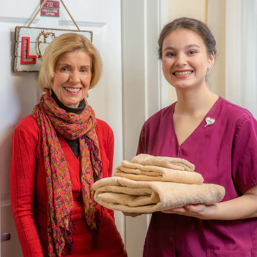 Alexis Estates women given towels to women